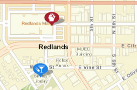 Map of Redlands area showing key locations with icons: a red icon for the mall on the north side and a blue icon for the library on the south side.