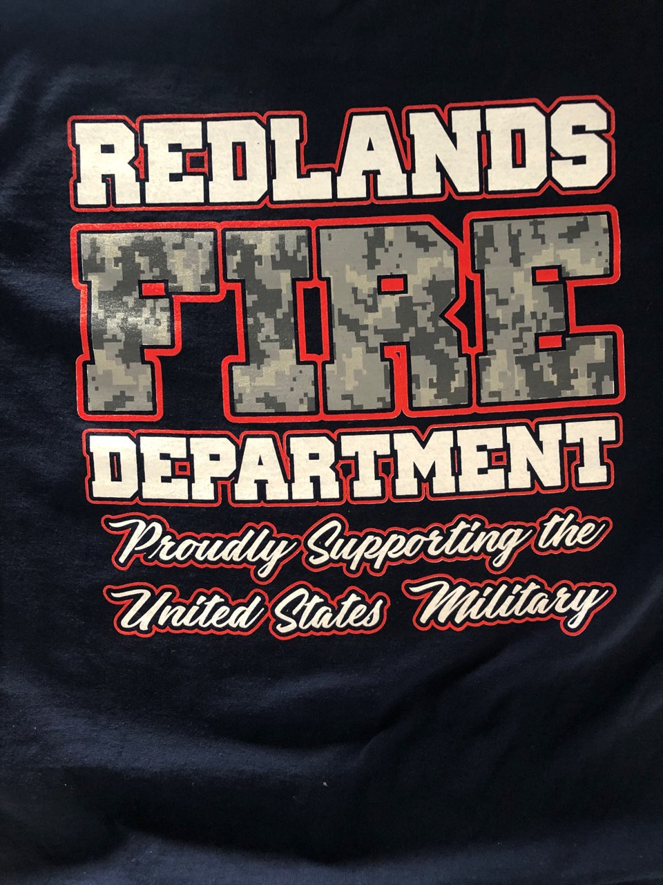 Firefighters wear T-shirts to honor military