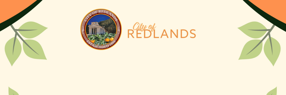 City of Redlands logo and text centered on a beige background with green and orange border accents and leaf illustrations in the corners.