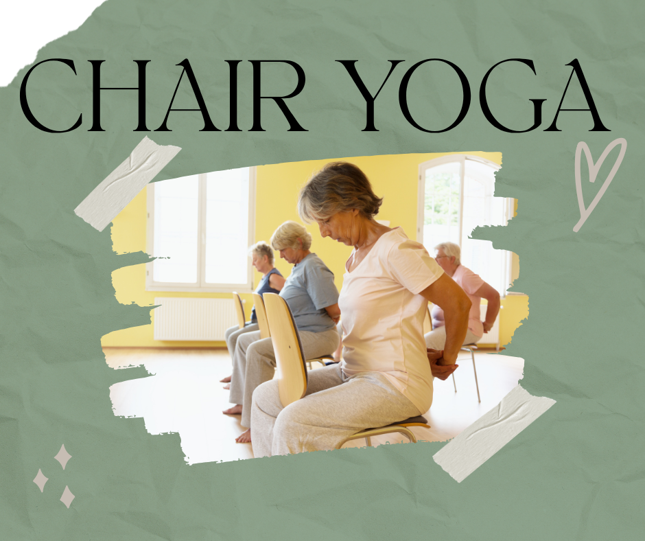 A group of older adults practice chair yoga in a bright room, seated on chairs with hands clasped behind their backs.