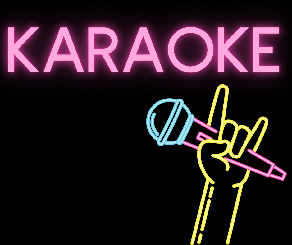 Neon sign with the word “KARAOKE” in pink and a yellow outlined hand holding a blue and pink microphone, forming a rock hand gesture.