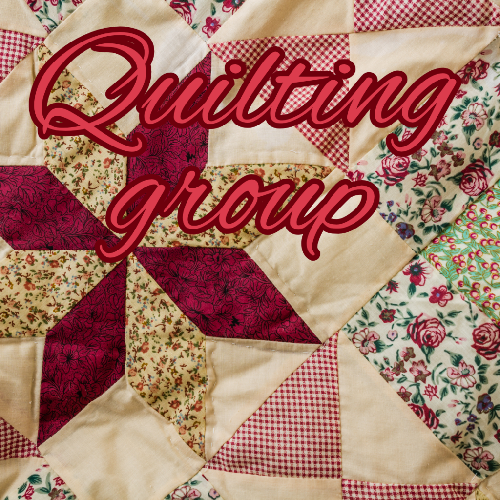 A colorful patchwork quilt with floral and checkered patterns, overlaid with the words “Quilting group” in large red script.